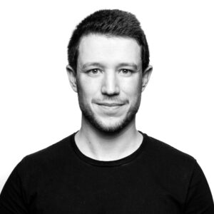 Das Schwarz-Weiß-Foto zeigt Jens Schneider, Geschäftsführer von Sachwert Invest