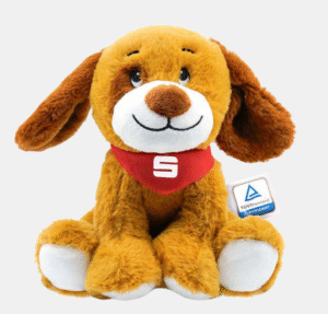 Bild von dem Plüschhund "Malou", den die Kinder bekommen, wenn sie beim Weltspartag ihr Kleingeld abgegeben haben