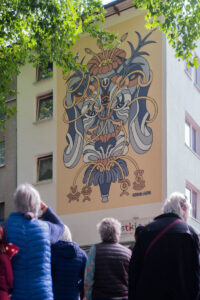 EIn Mural von Stepa Aifo an einer Fassade in Gröpelingen